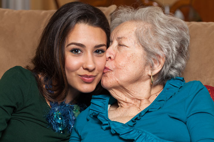 CDPAP program happy grandma kisses her granddaughter