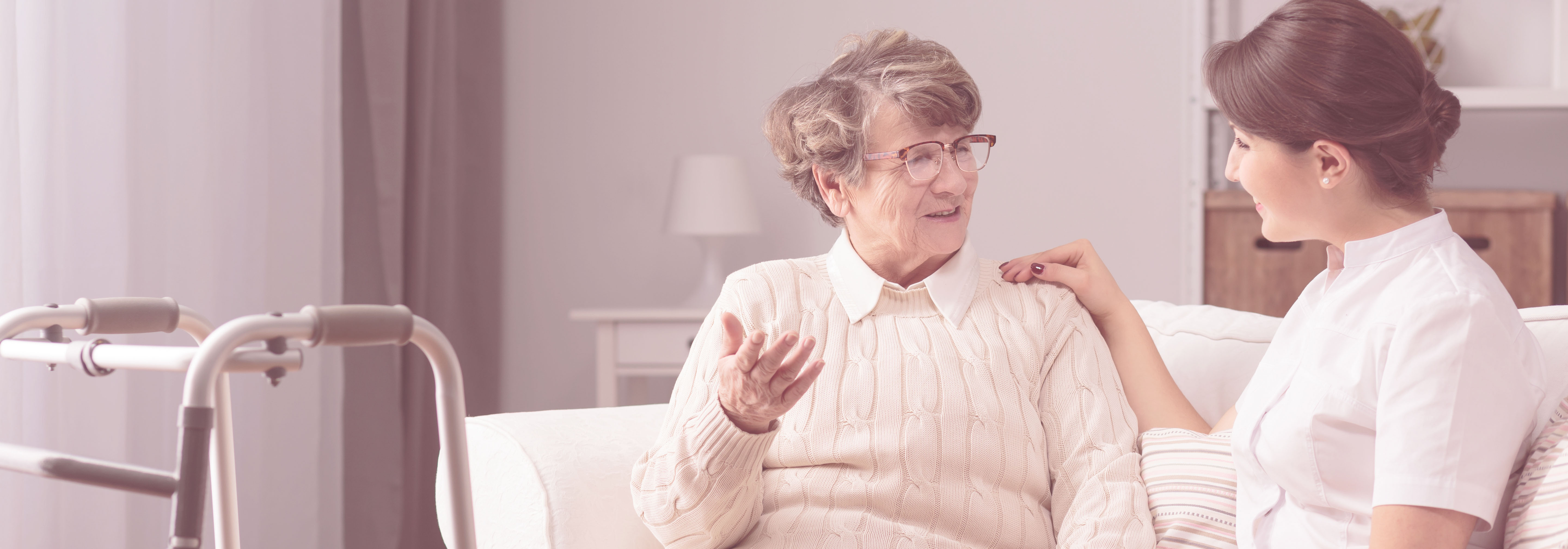 a care giver is discussing workers compensation home care options with an elderly patient